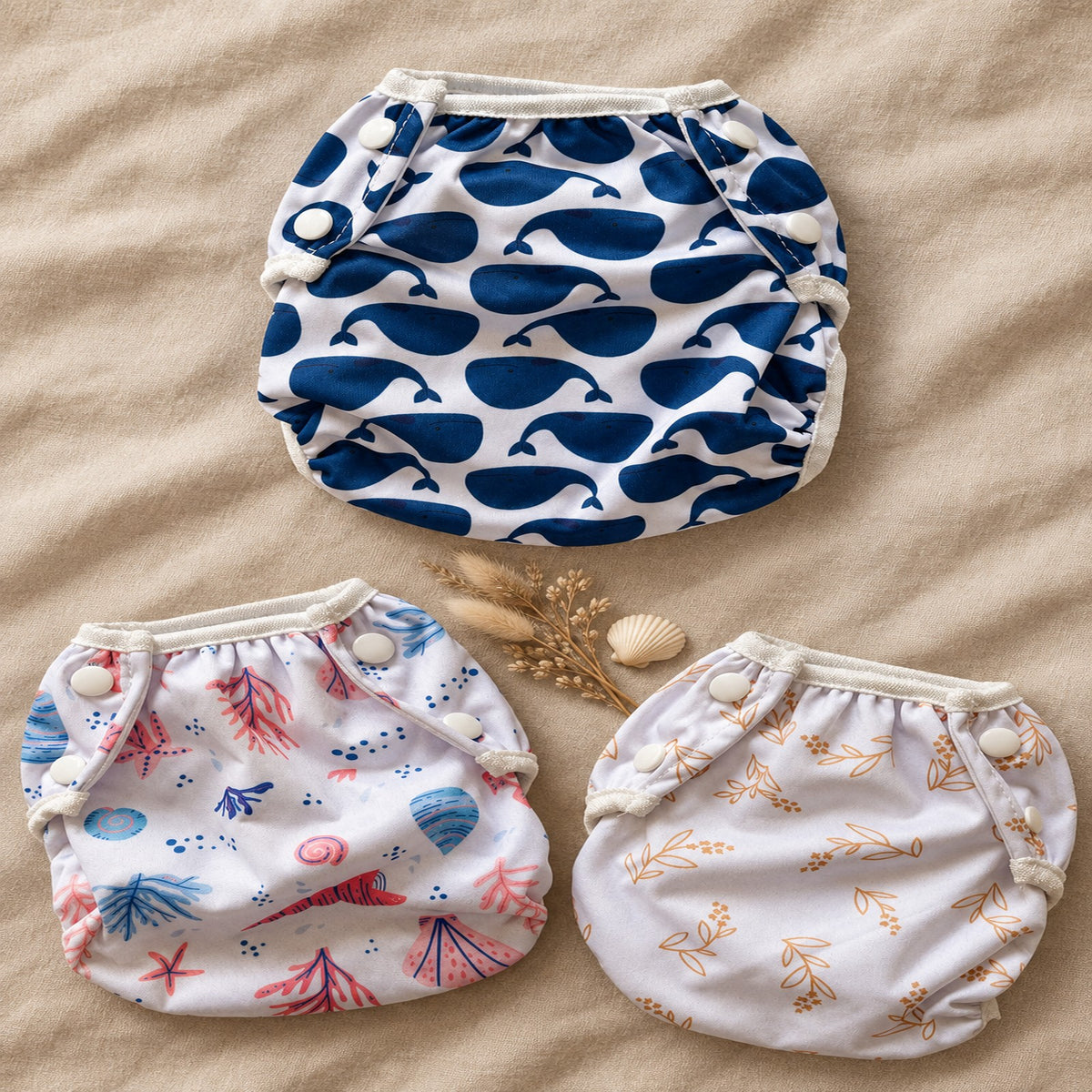 Wasbare zwemluier Walvis design – collectie flat-lay